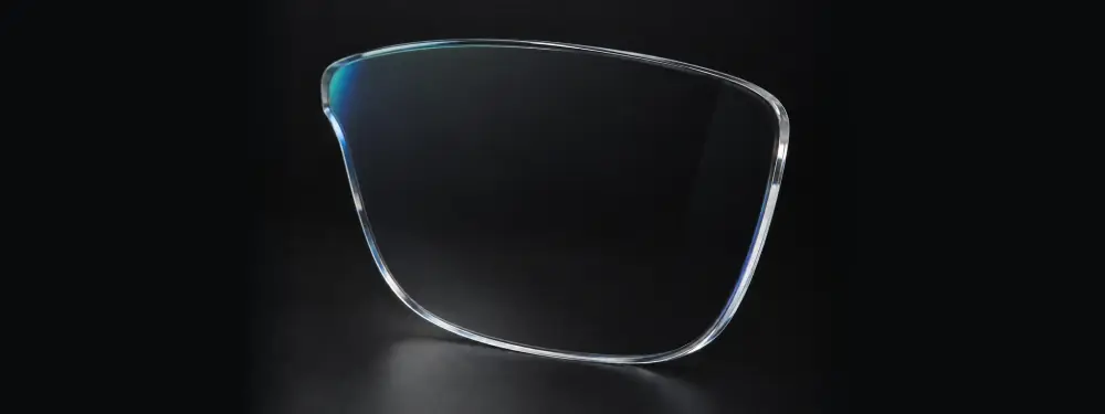 A mesma lente com o reflexo reduzido e um subtil tom residual do tratamento antirreflexo